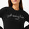 https://cdn.shopify.com/s/files/1/0139/8942/files/Q4_2023_11_NAVY_LINGUAFRANCAJUSTSAVINGLIVESSWEATER_W_CHARO_0730.jpg?v=1702060719
