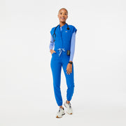 https://cdn.shopify.com/s/files/1/0139/8942/files/Q4_2023_11_ROYALBLUE_RAFAELACARGOSCRUBJUMPSUIT_W_DEJA4510.jpg?v=1705439389