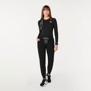 https://cdn.shopify.com/s/files/1/0139/8942/files/Q4_2024_10_BLACK_LSWAFFLEUNDERSCRUB_MELANIE_00495.jpg?v=1728338306