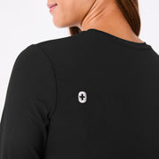 https://cdn.shopify.com/s/files/1/0139/8942/files/Q4_2024_10_BLACK_RIBBEDUNDERSCRUB_CHARO_915.jpg?v=1731960703