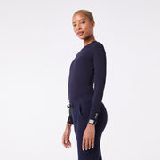 https://cdn.shopify.com/s/files/1/0139/8942/files/Q4_2024_10_NAVY_RIBBEDUNDERSCRUB_DEJA_1460.jpg?v=1731971640