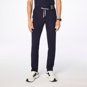 https://cdn.shopify.com/s/files/1/0139/8942/files/Q4_2024_10_NAVY_SANFORDSLIMTAPEREDPANT_SCOTT_29302_d0d8e2fc-9298-436b-9aae-6d187adcee58.jpg?v=1730846640