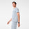 https://cdn.shopify.com/s/files/1/0139/8942/files/Q4_2024_11_DUSTYBLUE_CORFIELDHENLEYSCRUBTOP_SCOTT_137.jpg?v=1732565373