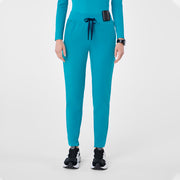 https://cdn.shopify.com/s/files/1/0139/8942/files/Q4_2024_11_TEAL_ALVAHIGHWAISTED_MADI_1643_V2.jpg?v=1736841880