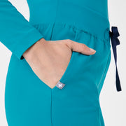 https://cdn.shopify.com/s/files/1/0139/8942/files/Q4_2024_11_TEAL_ALVAHIGHWAISTED_MADI_1670.jpg?v=1736357835