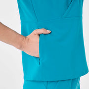 https://cdn.shopify.com/s/files/1/0139/8942/files/Q4_2024_11_TEAL_TIVOLISLIM_MADI_1611.jpg?v=1736360766
