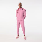 https://cdn.shopify.com/s/files/1/0139/8942/files/Q4_2024_12_CHALKPINK_ANDESRELAXEDSCRUBTOP_TERRANCE_0664.jpg?v=1736438650