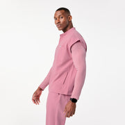 https://cdn.shopify.com/s/files/1/0139/8942/files/Q4_2024_12_CHALKPINK_ANDESRELAXEDSCRUBTOP_TERRANCE_0701.jpg?v=1736438650