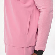 https://cdn.shopify.com/s/files/1/0139/8942/files/Q4_2024_12_CHALKPINK_ANDESRELAXEDSCRUBTOP_TERRANCE_0737.jpg?v=1736438650