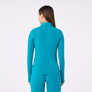 https://cdn.shopify.com/s/files/1/0139/8942/files/Q4_2024_12_TEAL_CONTOURKNIT_CHARO_1105.jpg?v=1736361182