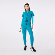 https://cdn.shopify.com/s/files/1/0139/8942/files/Q4_2024_12_TEAL_LANYARD_CHARO_1465.jpg?v=1736439564