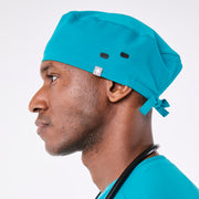 https://cdn.shopify.com/s/files/1/0139/8942/files/Q4_2024_12_TEAL_MODERNCLASSICSCRUBCAP_TERRANCE_862.jpg?v=1736439720