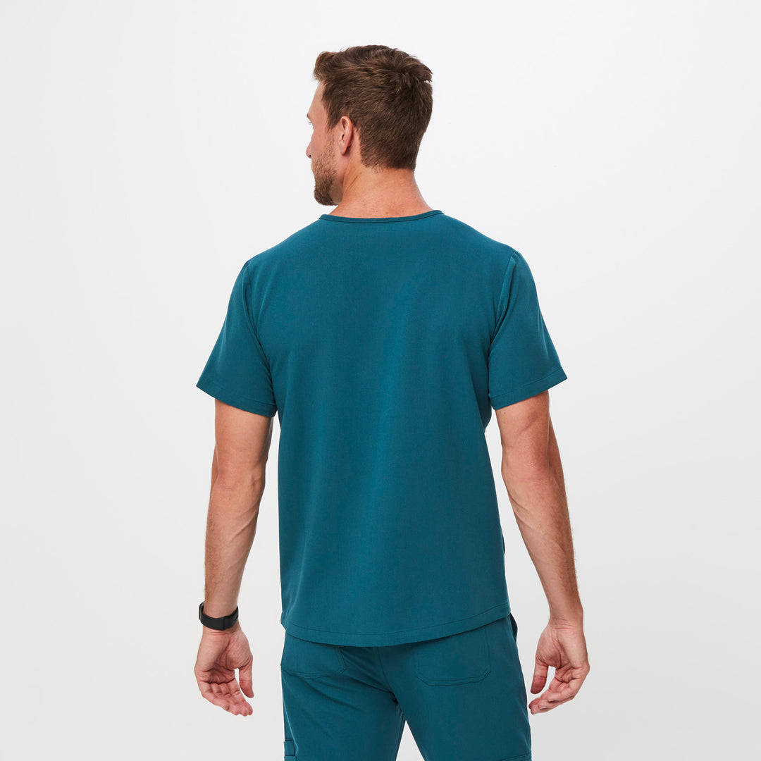 Men's Chisec ThreePocket Scrub Top™ Caribbean Blue · FIGS