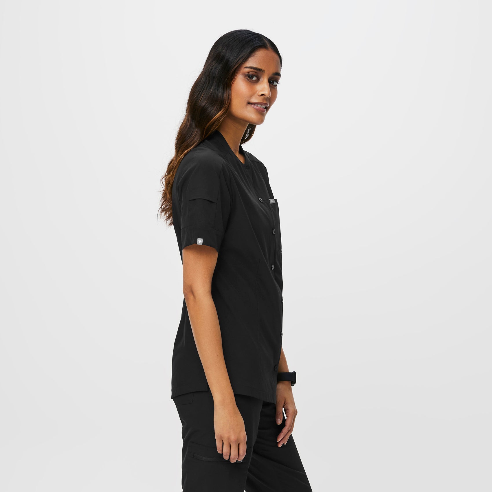 https://cdn.shopify.com/s/files/1/0139/8942/products/Q1_2023_01_FREE-X-BLACK_MENA-TOP_W_ALYSSAH_15393.jpg?v=1679499183