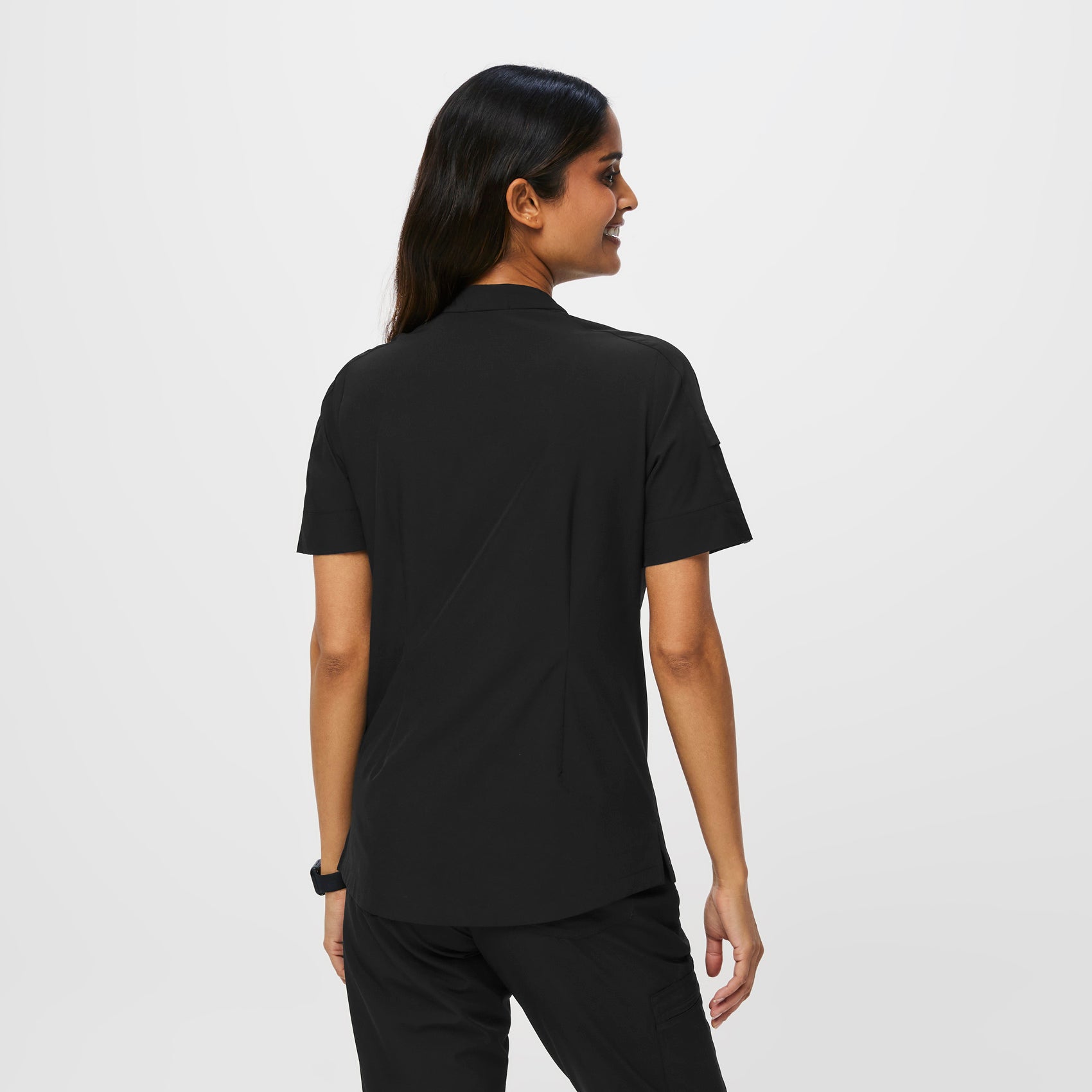 https://cdn.shopify.com/s/files/1/0139/8942/products/Q1_2023_01_FREE-X-BLACK_MENA-TOP_W_ALYSSAH_15397.jpg?v=1679499182