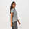 https://cdn.shopify.com/s/files/1/0139/8942/products/Q1_2023_01_HEATHER-GREY_SLIM-TECHNICAL-PIQUE-POLO_W_ALYSSAH_16499.jpg?v=1680543068