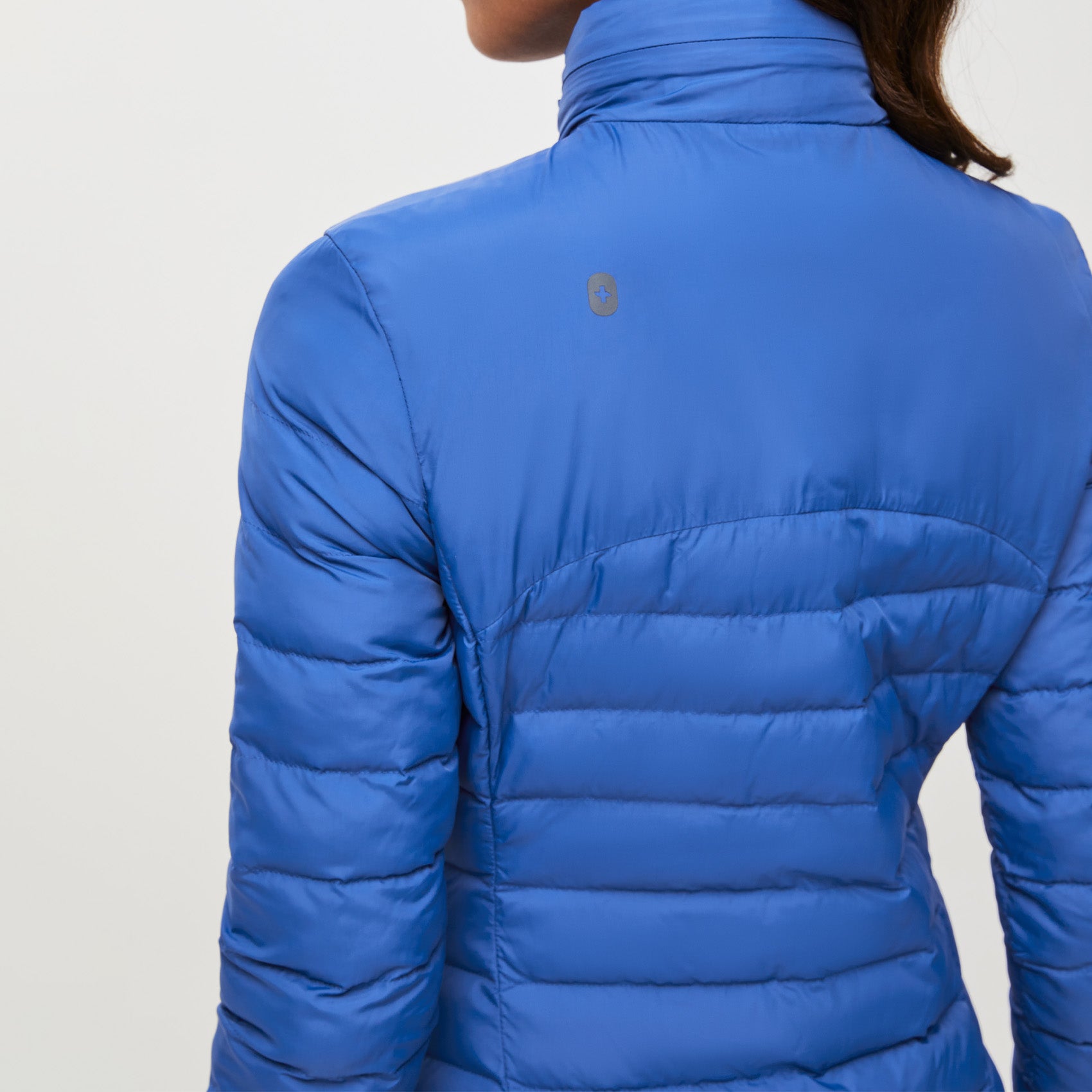 https://cdn.shopify.com/s/files/1/0139/8942/products/Q1_2023_01_WINNING-BLUE_PACKABLE-PUFFER-JACKET_W_NATALIE_30852.jpg?v=1676066511