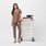 https://cdn.shopify.com/s/files/1/0139/8942/products/Q1_2023_02_DEEP-TAUPE_CATARINA_W_JOSIE_42926_9d4193a7-4796-42ae-b504-79bc17a68b4a.jpg?v=1681343987