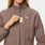 https://cdn.shopify.com/s/files/1/0139/8942/products/Q1_2023_03_DEEP-TAUPE_PAGE-SCRUBJACKET_W_MADI_69214.jpg?v=1682105533