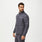 https://cdn.shopify.com/s/files/1/0139/8942/products/Q1_2023_12_CHARCOAL_PACKABLE-PUFFER_M_RYAN_107.jpg?v=1678412401