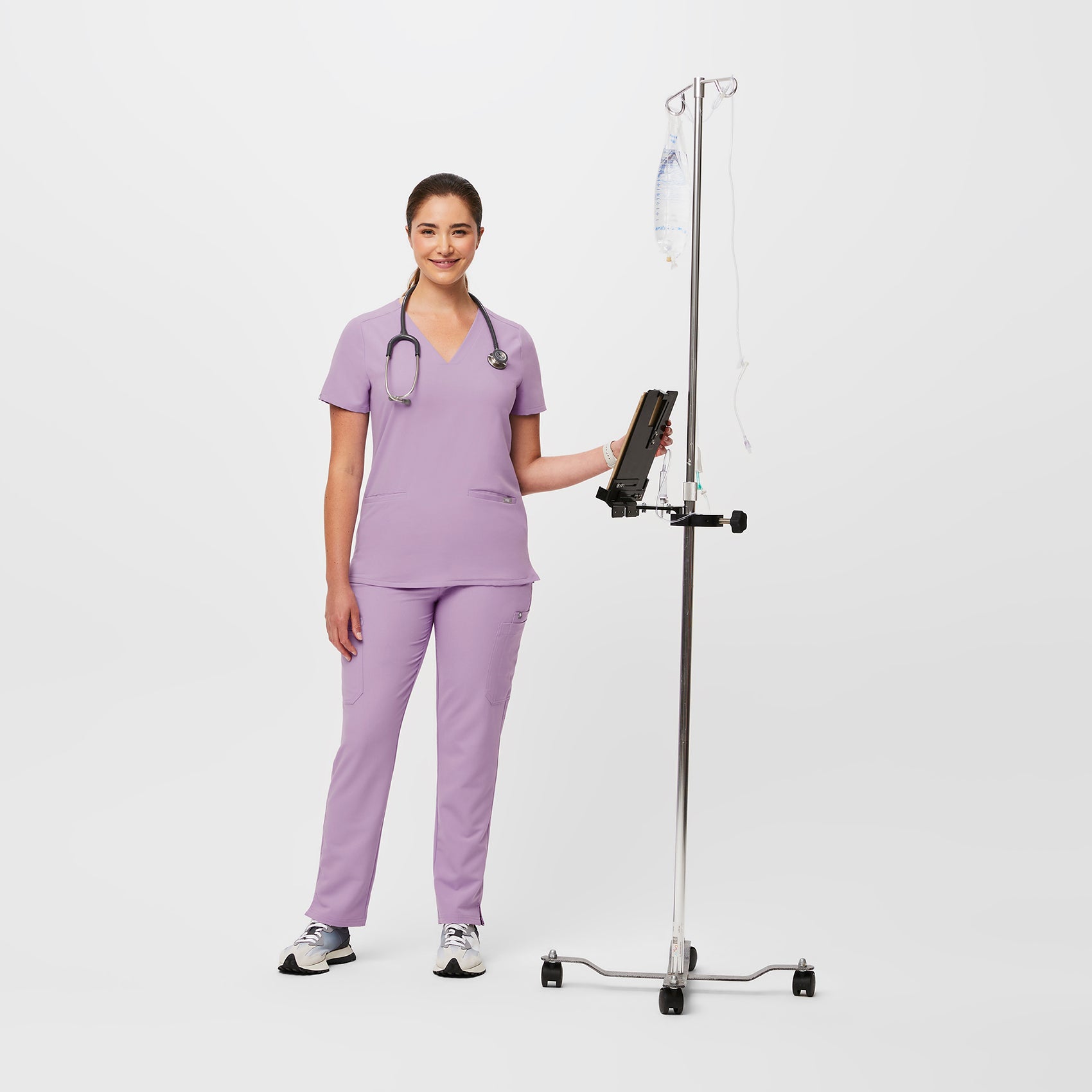 Women's Casma ThreePocket Scrub Top™ Lavender Dew · FIGS