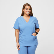 Blusa de uniforme médico con tres bolsillos para mujer