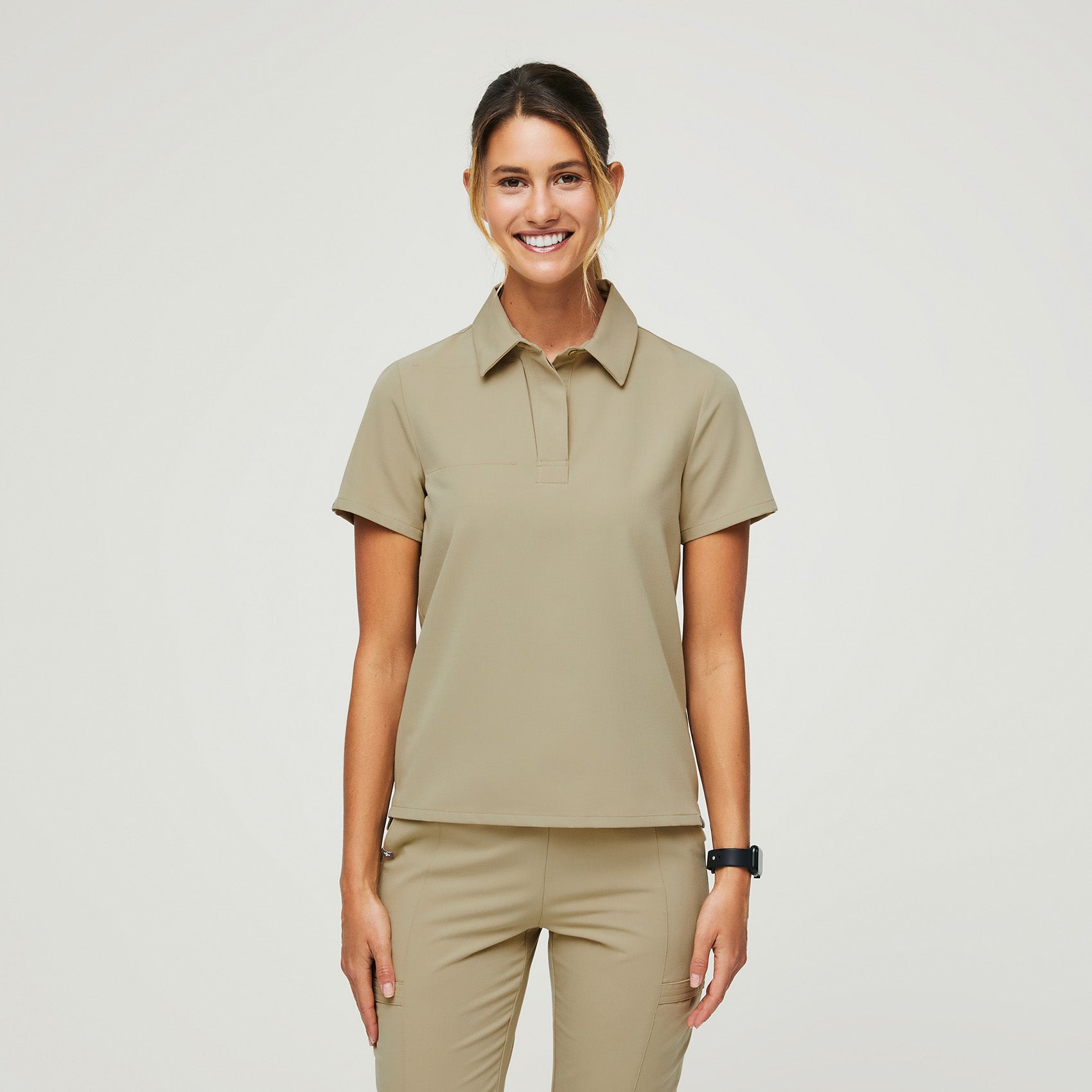 https://cdn.shopify.com/s/files/1/0139/8942/products/Womens-Nala-SS-Polo-Scrub-Top_dustysand-1.jpg?v=1647480278