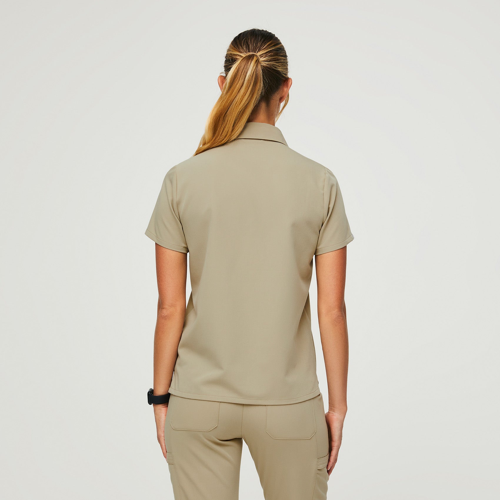 https://cdn.shopify.com/s/files/1/0139/8942/products/Womens-Nala-SS-Polo-Scrub-Top_dustysand-4.jpg?v=1647480278